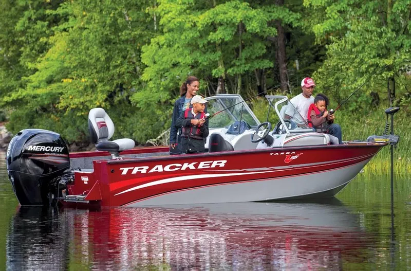 Slide: The Image of Family fishing on 2014 Tracker Targa V-18 Combo boat. - 10