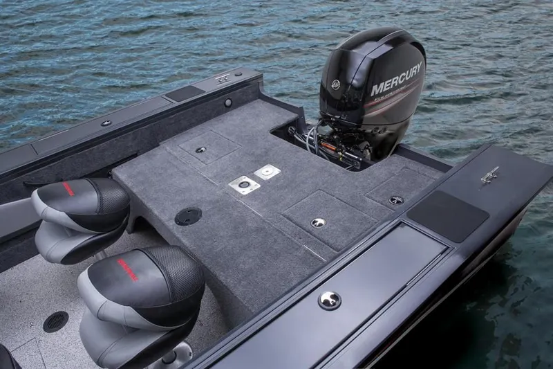 Slide: The Image of 2014 Tracker Targa V-18 Combo boat with Mercury engine on water. - 16