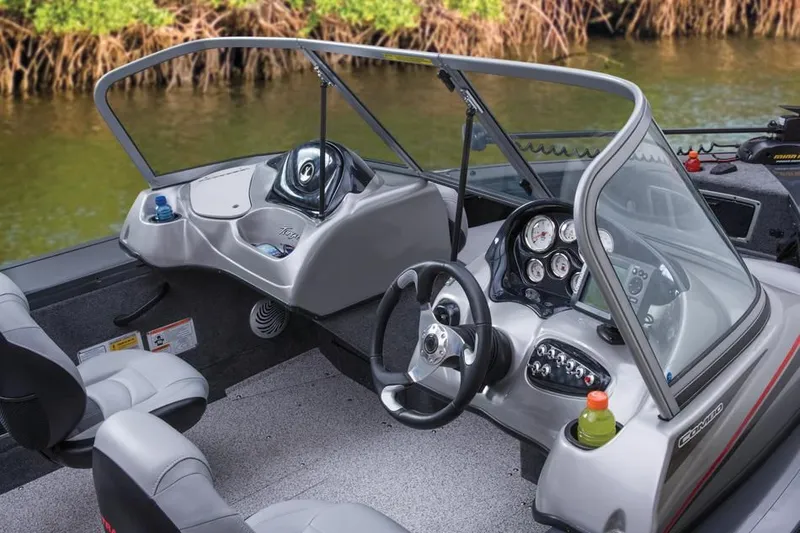 Slide: The Image of Interior of a 2014 Tracker Targa V-18 Combo boat with steering console. - 22