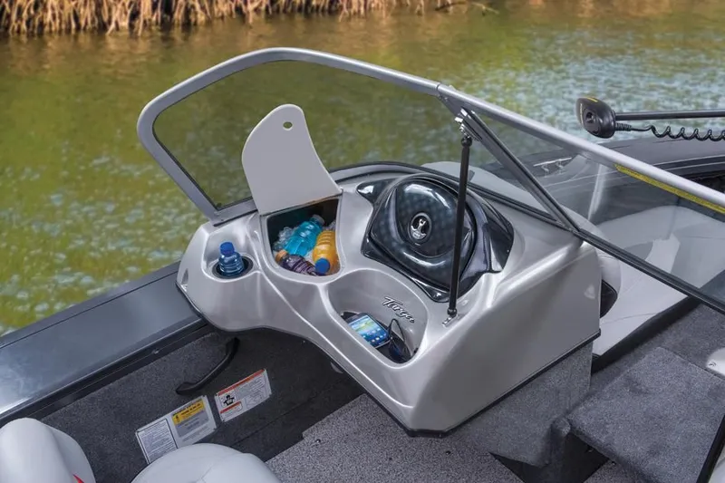 Slide: The Image of 2014 Tracker Targa V-18 Combo boat console with cup holders. - 23