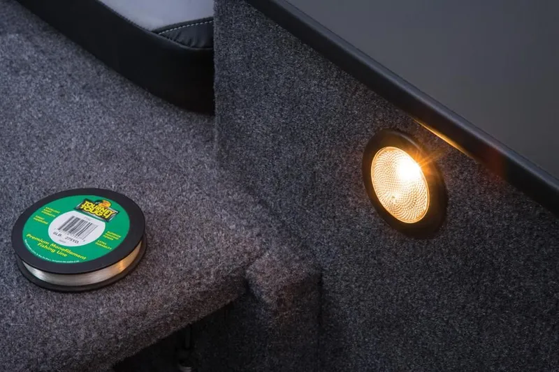 Slide: The Image of 2014 Tracker Targa V-18 Combo interior with lighting and fishing line. - 25