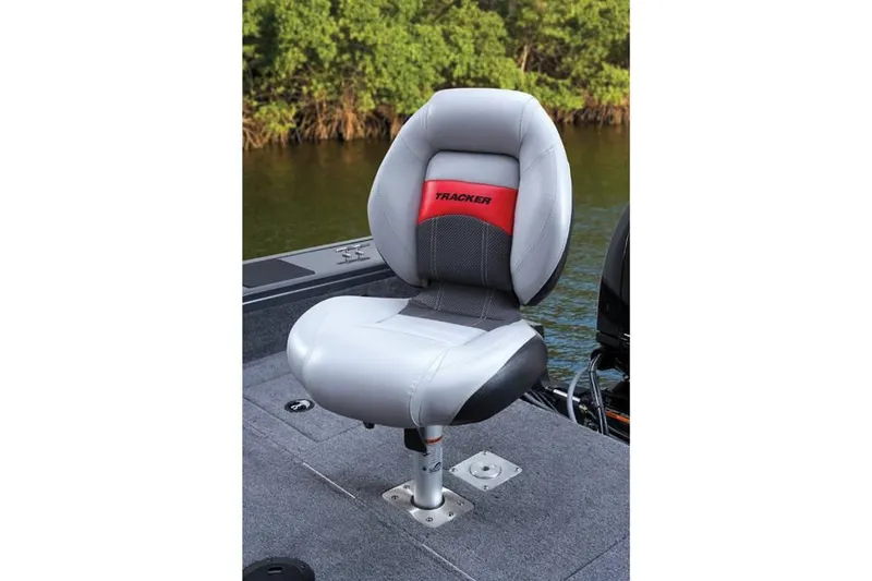 Slide: The Image of Tracker Targa V-18 Combo 2014 boat seat on gray deck. - 28