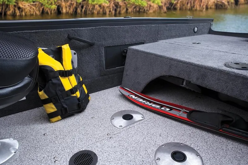 Slide: The Image of Interior of 2014 Tracker Targa V-18 Combo with life jacket and water ski. - 29