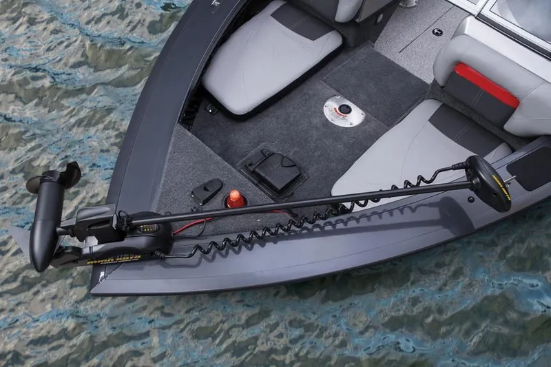 Slide: The Image of 2014 Tracker Targa V-18 Combo boat with trolling motor on water. - 31
