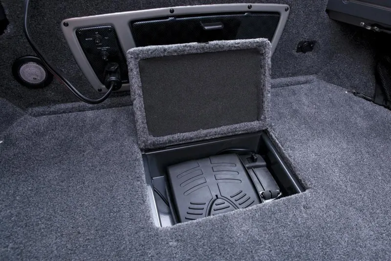 Slide: The Image of 2014 Tracker Targa V-18 Combo boat interior with storage compartment. - 33