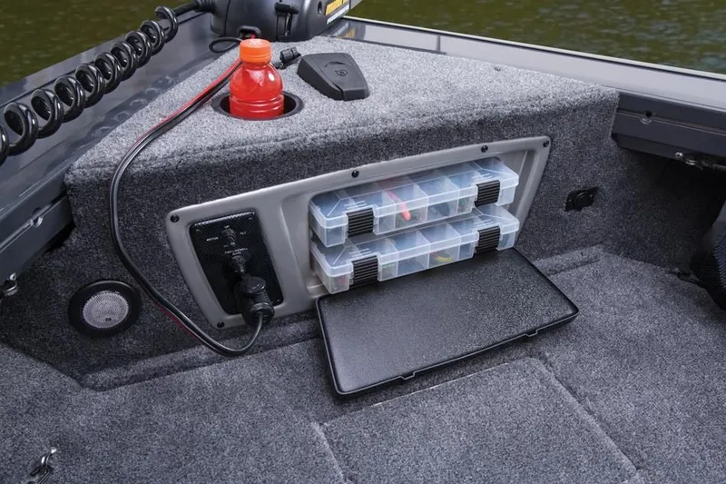 Slide: The Image of 2014 Tracker Targa V-18 Combo boat with storage and cup holder. - 35