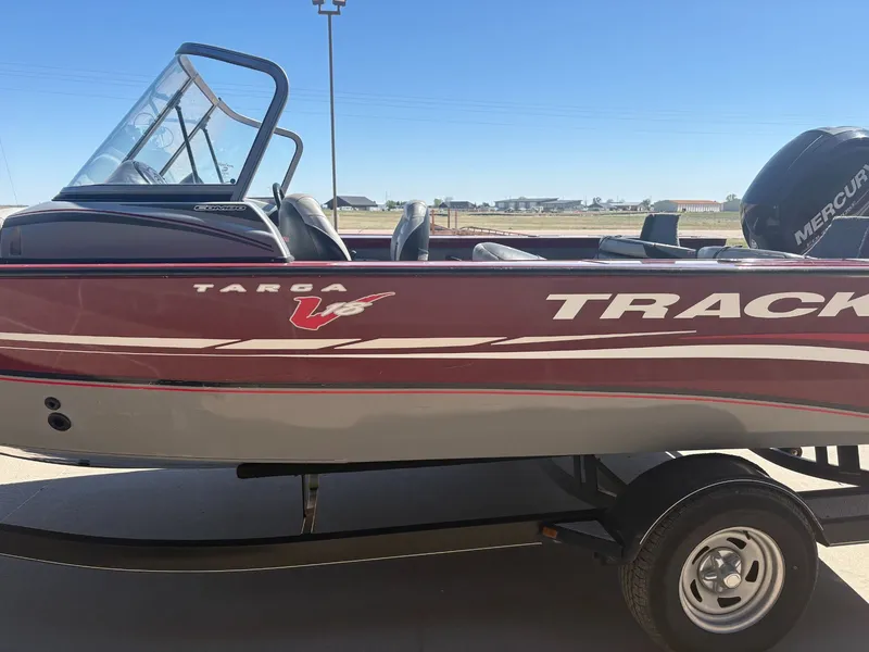 Slide: The Image of 2014 Tracker Targa V-18 Combo boat on trailer. - 8