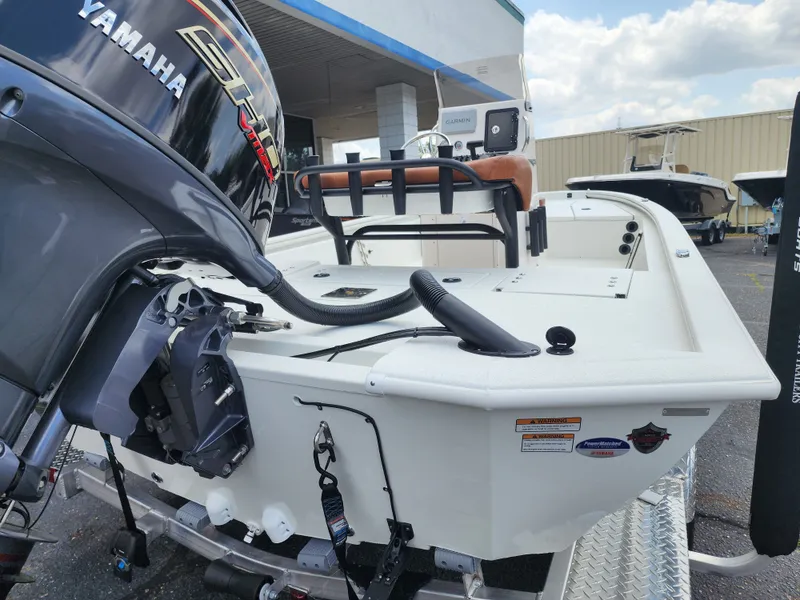 Slide: The Image of Avid 19 FSX 2026 boat with Yamaha motor on trailer. - 10