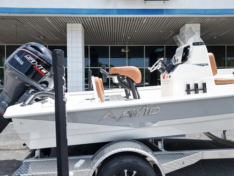 Slide: The Image of Avid 19 FSX 2026 boat with Yamaha engine on trailer. - 7