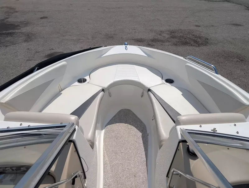 Slide: The Image of Interior view of a 2008 Glastron GT 205 boat with seating area. - 13