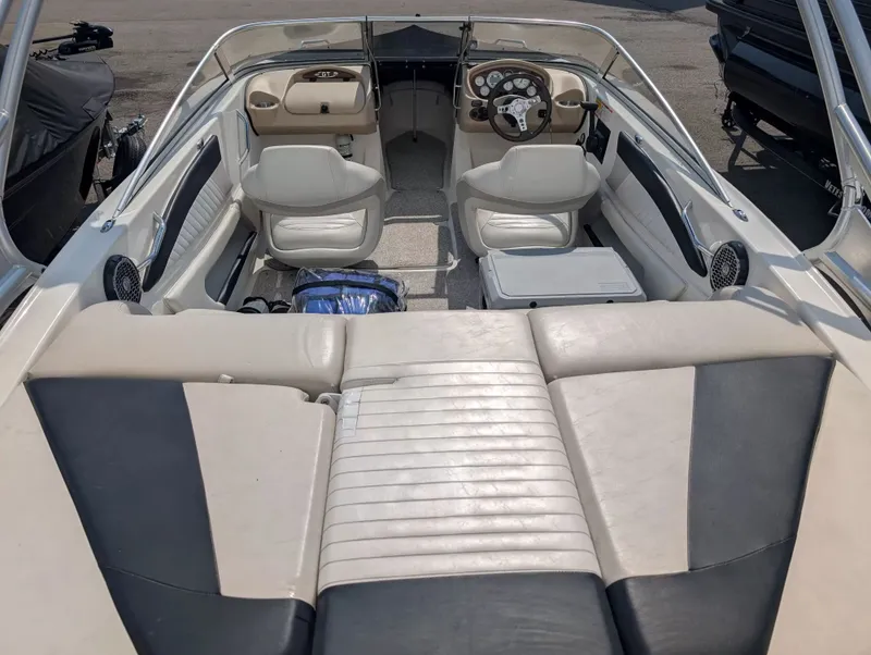 Slide: The Image of Interior of a 2008 Glastron GT 205 boat with seating. - 7