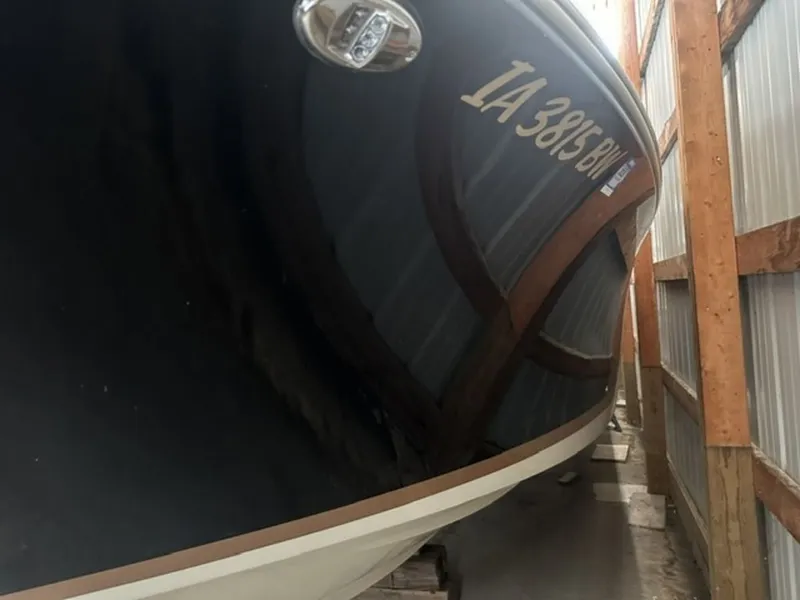 Slide: The Image of 2022 Chris-Craft Launch 28 GT boat in storage facility. - 3