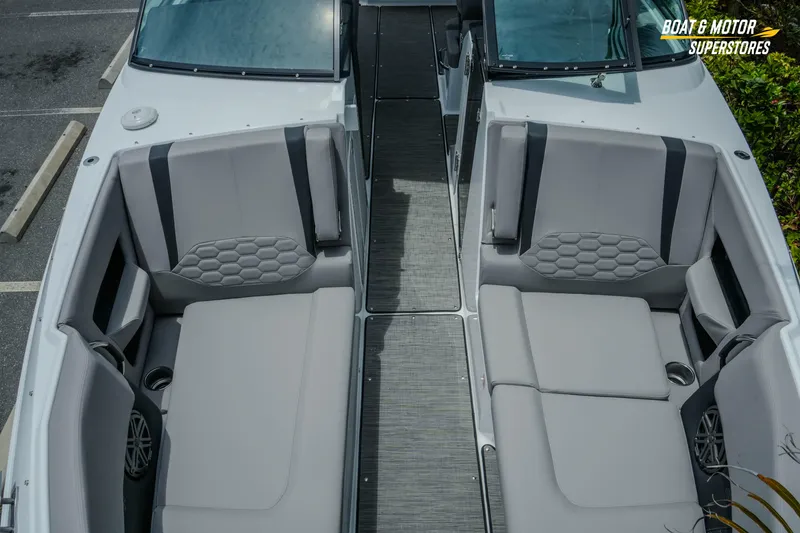 Slide: The Image of 2026 Four Winns H9 OB boat interior with gray seating and modern design. - 15