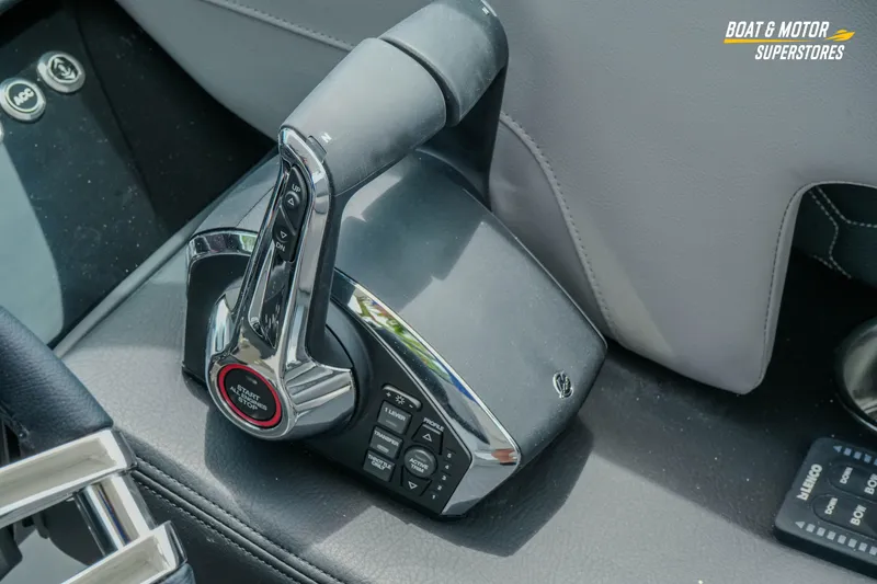 Slide: The Image of Throttle control of 2026 Four Winns H9 OB boat, featuring modern design and functionality. - 29