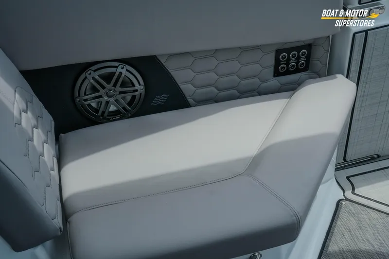 Slide: The Image of 2026 Four Winns H9 OB boat interior with speaker and control panel. - 36