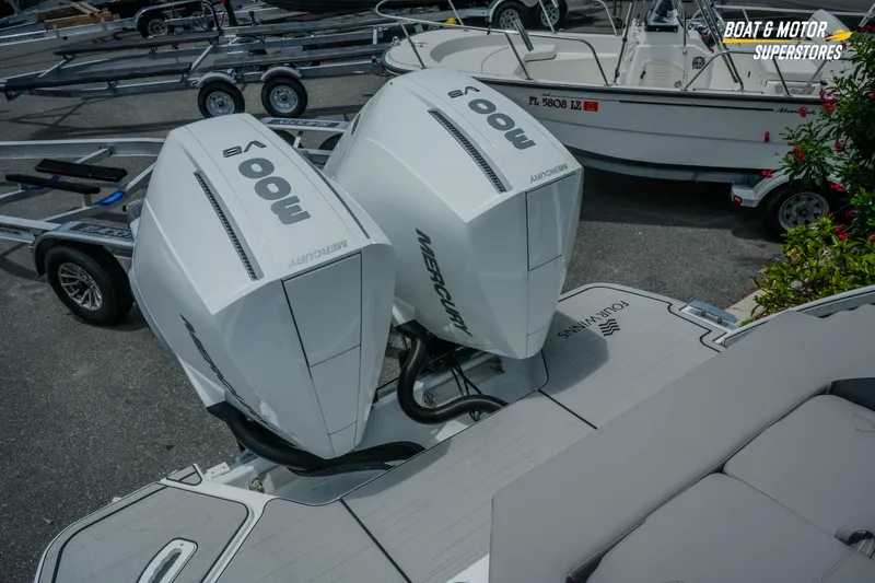 Slide: The Image of 2026 Four Winns H9 OB boat with dual Mercury 300 V8 outboard engines. - 39