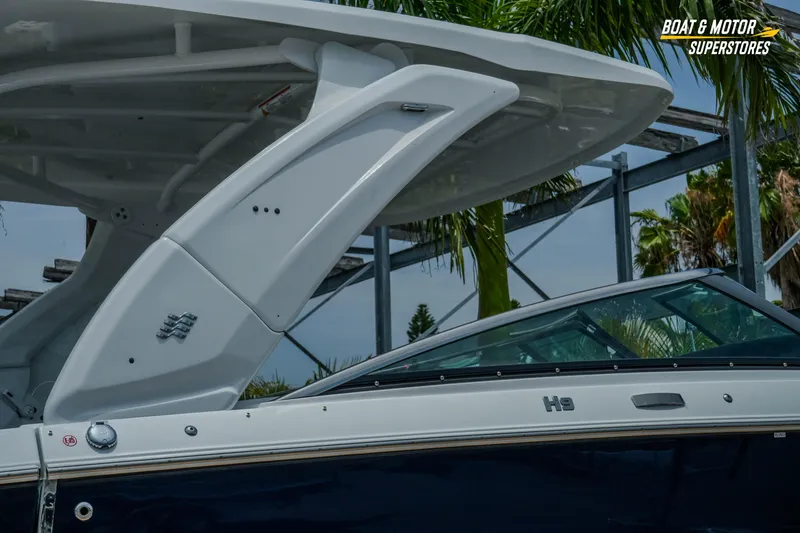 Slide: The Image of 2026 Four Winns H9 OB boat with sleek design and modern features. - 43