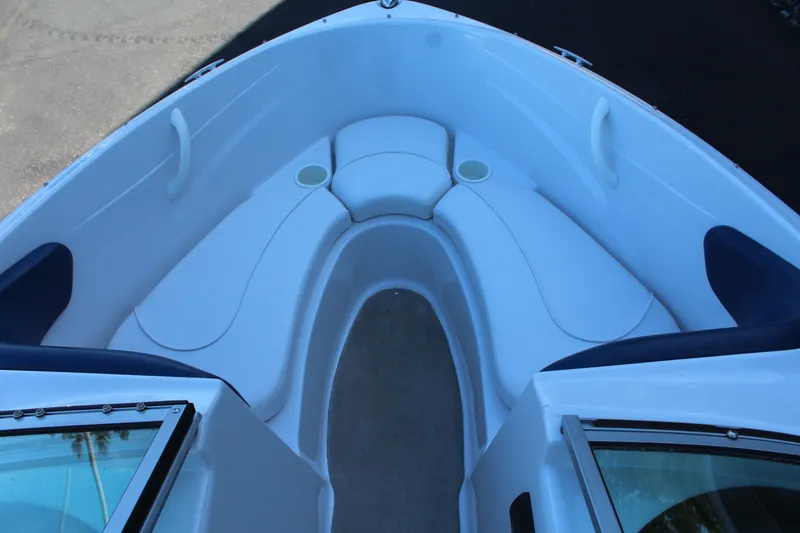 Slide: The Image of Interior of 2011 Four Winns H180 LE boat with seating area. - 12