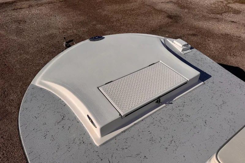 Slide: The Image of 2006 Waterman K-18 boat deck with textured hatch cover. - 19