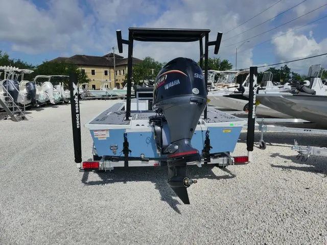 Slide: The Image of Rear view of 2026 Xpress Skiff 185 boat with Yamaha outboard motor. - 5