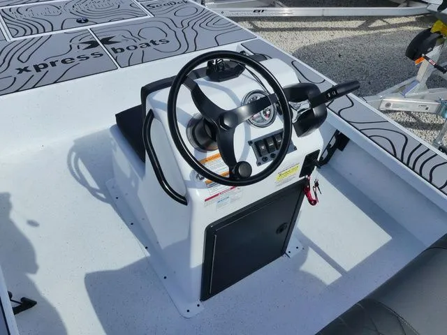 Slide: The Image of Steering console of Xpress Skiff 185 boat, model 2026. - 9