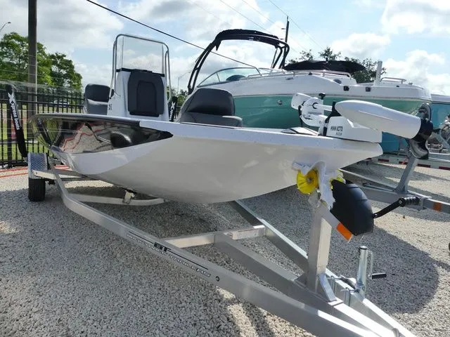 The Image of 2026 Xpress HYPER-LIFT H20 BAY boat on trailer, side view. - 1