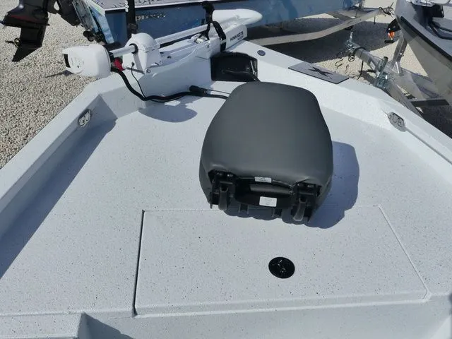 Slide: The Image of 2026 Xpress HYPER-LIFT H20 BAY boat with gray seat and controls. - 10