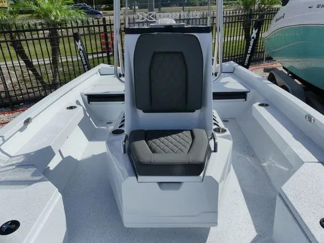 Slide: The Image of 2026 Xpress HYPER-LIFT H20 BAY boat with modern seating design. - 14