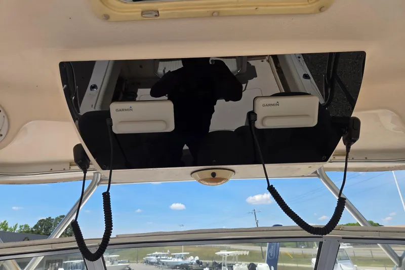 Slide: The Image of 2007 Grady-White Express 305 boat with Garmin electronics installed on the dashboard. - 15