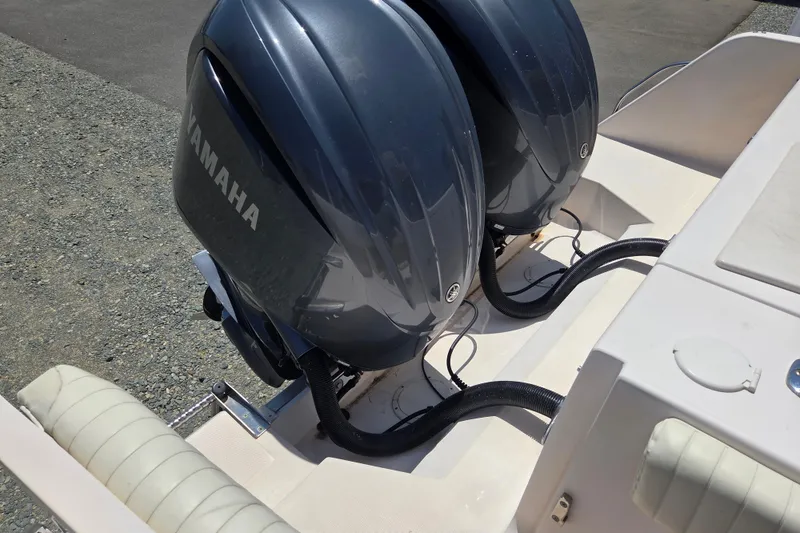 Slide: The Image of Twin Yamaha outboard engines on a 2007 Grady-White Express 305 boat. - 8