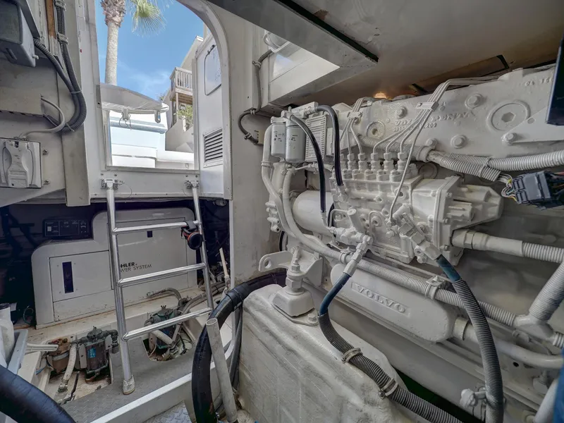 Slide: The Image of Engine room of 2004 Bertram 390 Convertible with ladder and engine. - 25