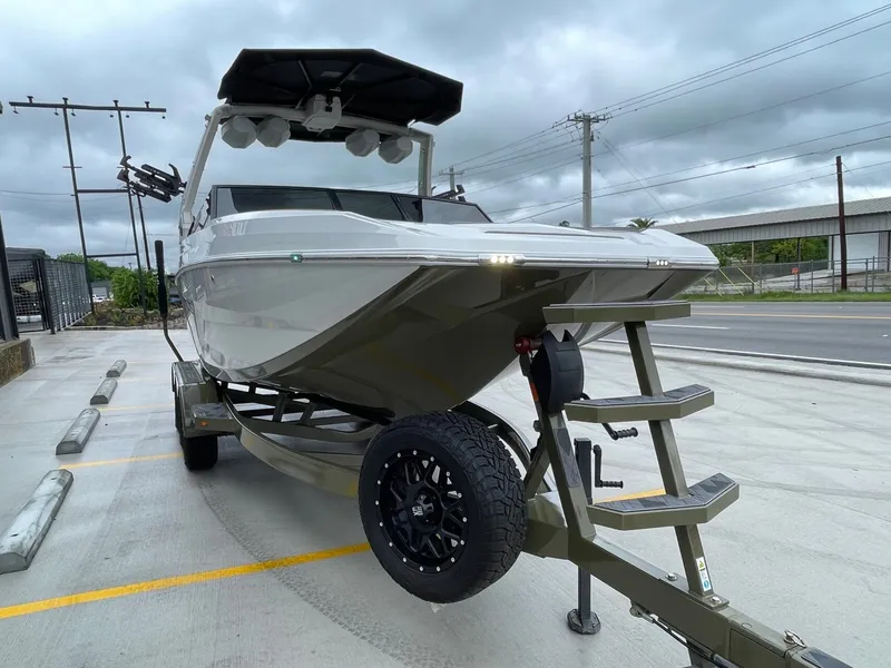 Slide: The Image of 2024 Tigé 24RZX boat on trailer, ready for adventure. - 10