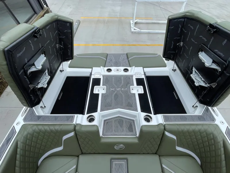 Slide: The Image of Interior of 2024 Tigé 24RZX boat with storage compartments. - 15