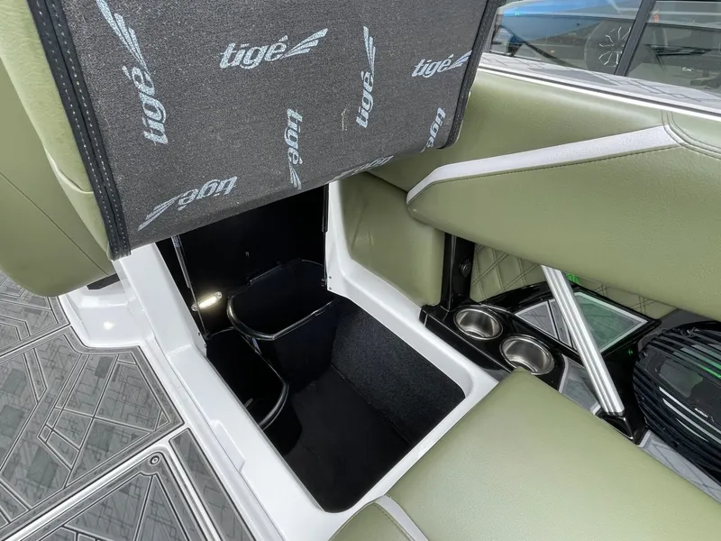 Slide: The Image of Interior of 2024 Tigé 24RZX with storage and cup holders. - 22