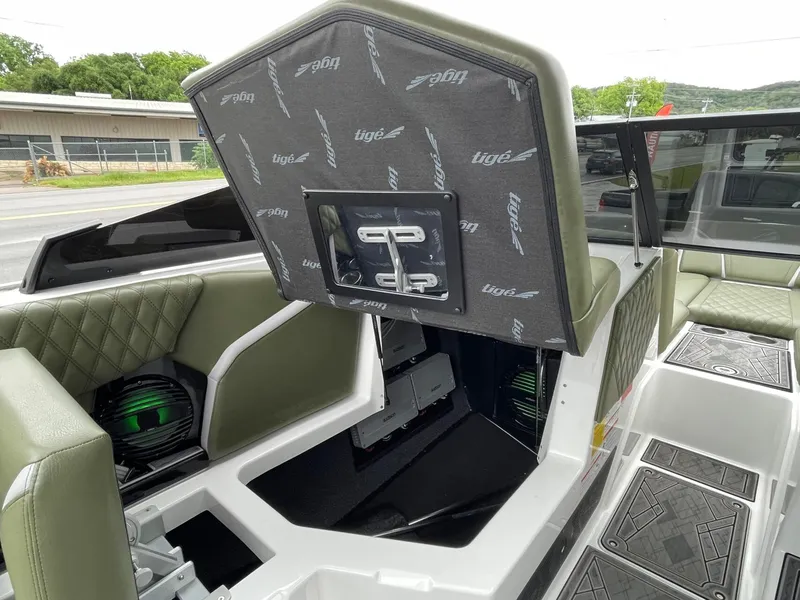 Slide: The Image of Interior view of 2024 Tigé 24RZX boat with seating and storage. - 35