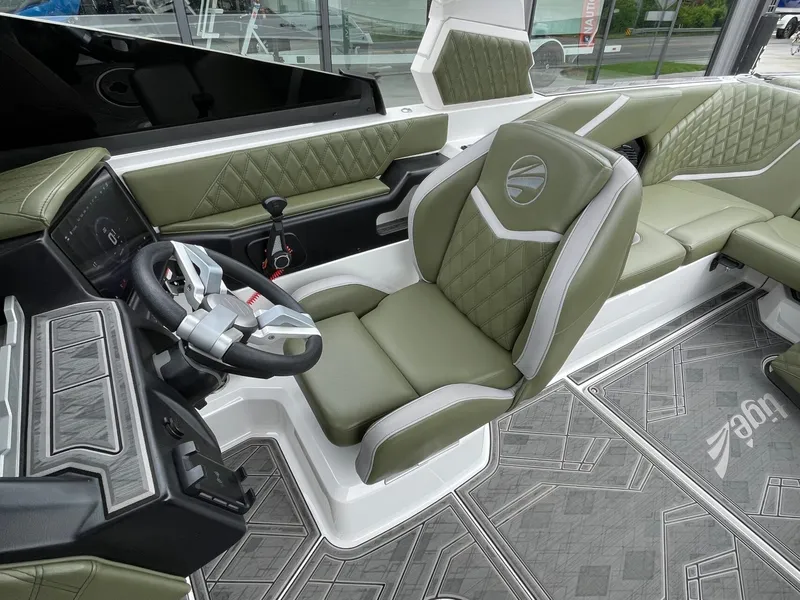 Slide: The Image of 2024 Tigé 24RZX interior with green upholstery and modern dashboard. - 37