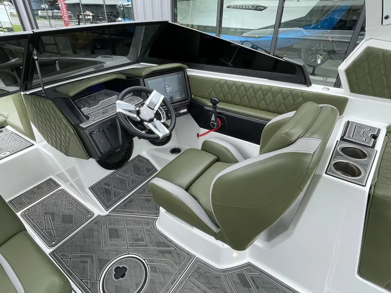 Slide: The Image of Interior of 2024 Tigé 24RZX boat with modern cockpit. - 38