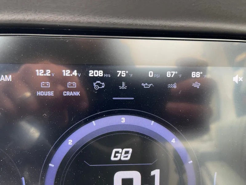 Slide: The Image of Tigé 24RZX 2024 dashboard displaying voltage and temperature readings. - 41