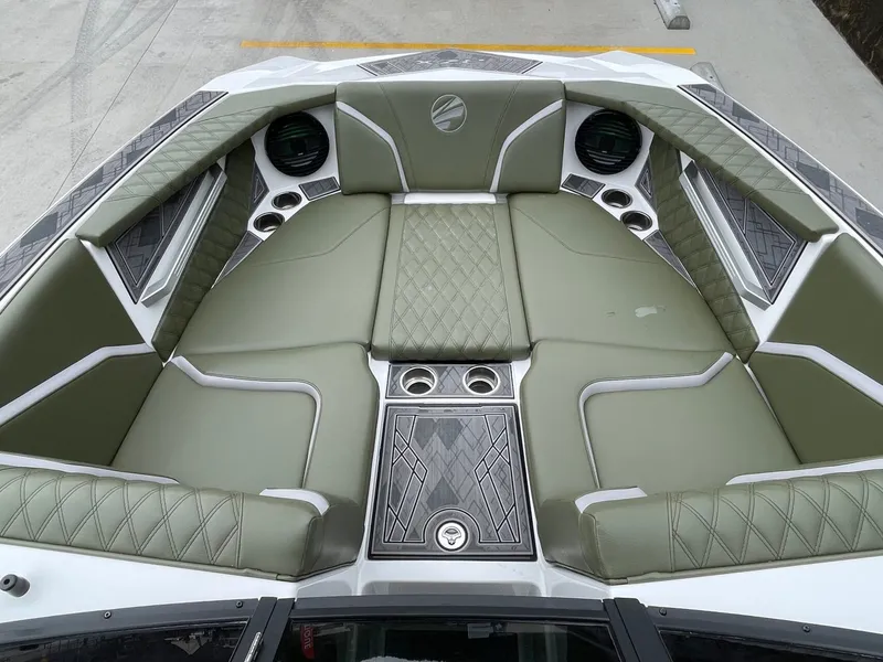Slide: The Image of Interior of 2024 Tigé 24RZX boat with green upholstery. - 43