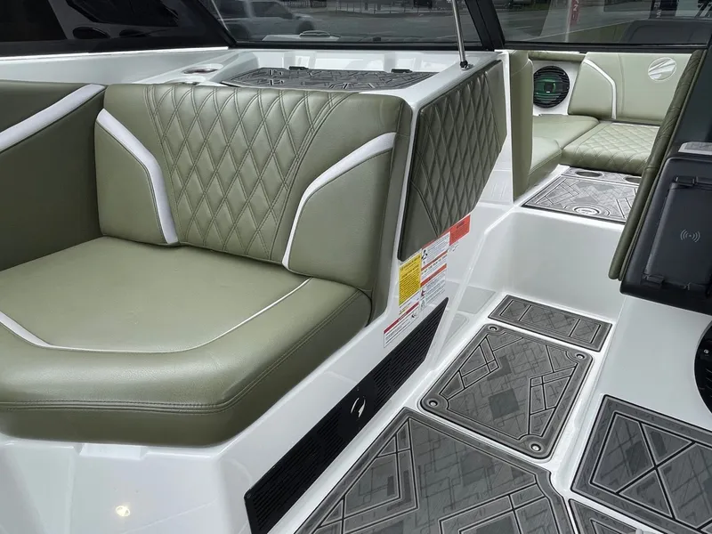 Slide: The Image of Interior of 2024 Tigé 24RZX with stylish seating and flooring. - 44