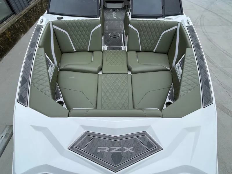 Slide: The Image of Interior of 2024 Tigé 24RZX featuring sleek seating. - 45
