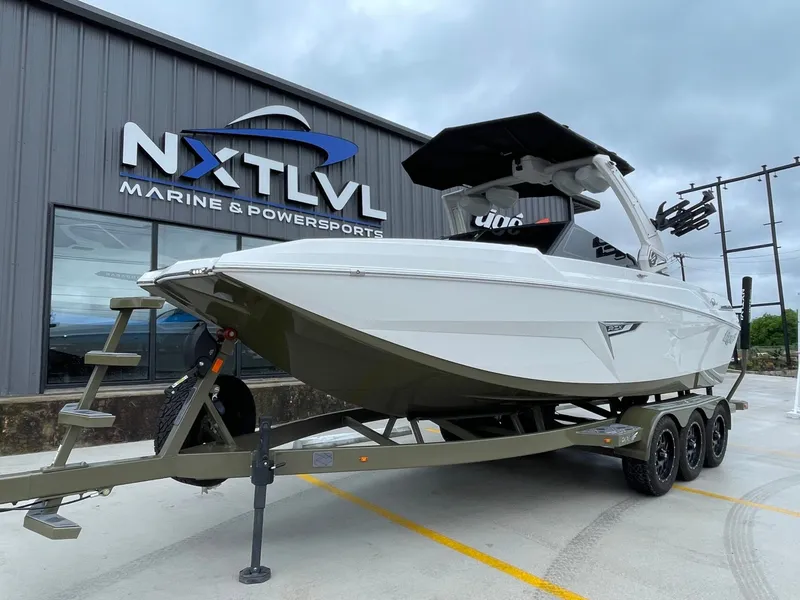 Slide: The Image of 2024 Tigé 24RZX boat outside NXT LVL Marine store. - 7