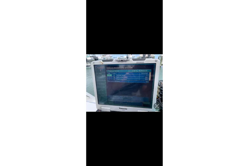 Slide: The Image of Yamaha diagnostic system on 2005 Boston Whaler 305 Conquest boat, displaying engine data. - 9