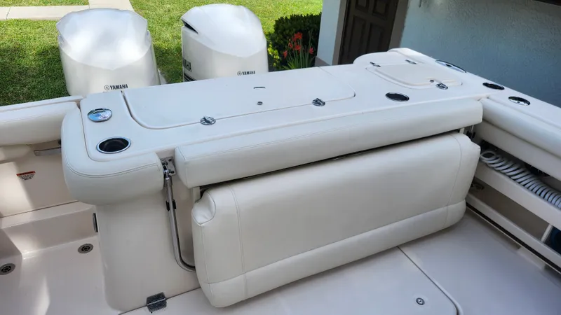 Slide: The Image of 2019 Grady-White Freedom 307 boat with Yamaha engines and luxurious seating area. - 10