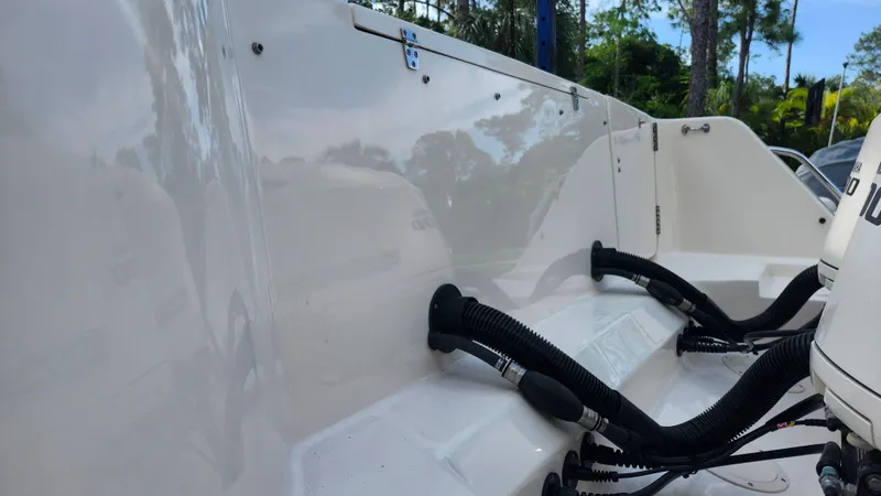 Slide: The Image of Grady-White Freedom 307 boat hull, 2019 model, with engine connections. - 16