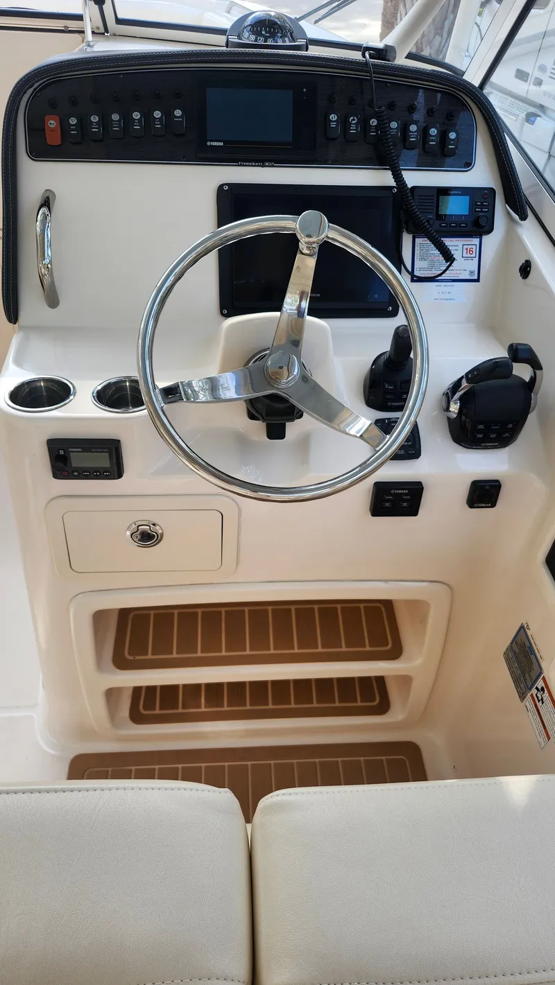 Slide: The Image of Grady-White Freedom 307 boat helm console, 2019 model. - 4