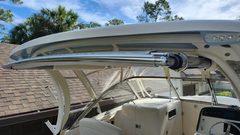 Slide: The Image of 2019 Grady-White Freedom 307 boat with sunshade. - 6