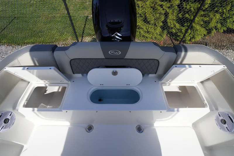 Slide: The Image of 2025 Key West 203 FS boat interior with storage compartments and seating. - 10