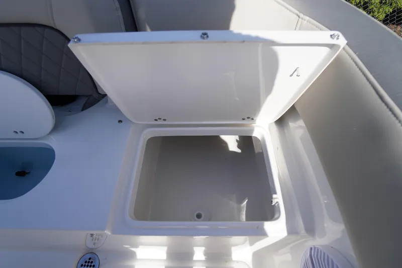 Slide: The Image of Open storage compartment on 2025 Key West 203 FS boat, showcasing interior space. - 12
