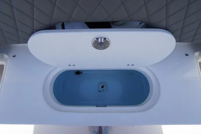Slide: The Image of Livewell compartment on 2025 Key West 203 FS boat, featuring a sleek, modern design. - 13